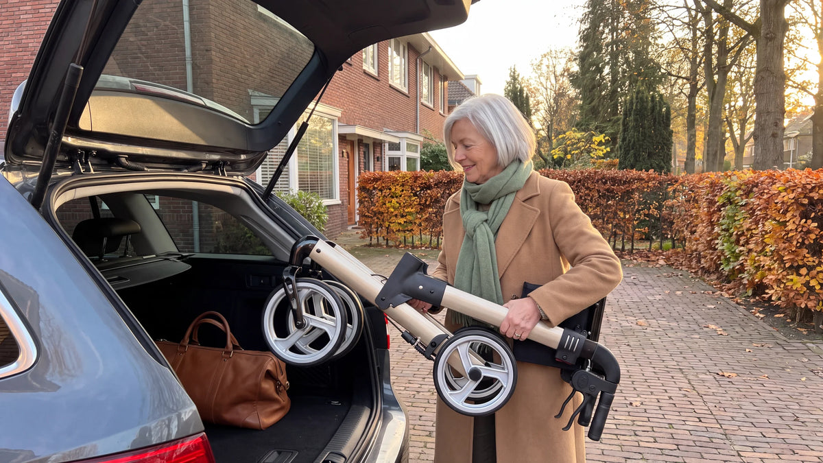 Folded Parvum Luxo in champagne; a woman lifts it into the trunk of her car on the driveway.